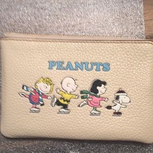 Coach peanuts Wristlet